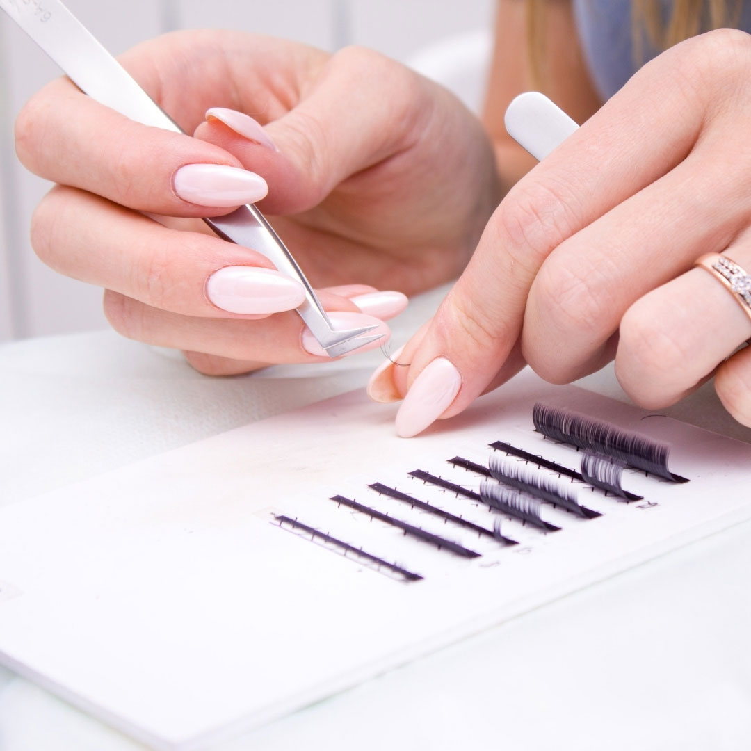 Lash tech making handmade fans