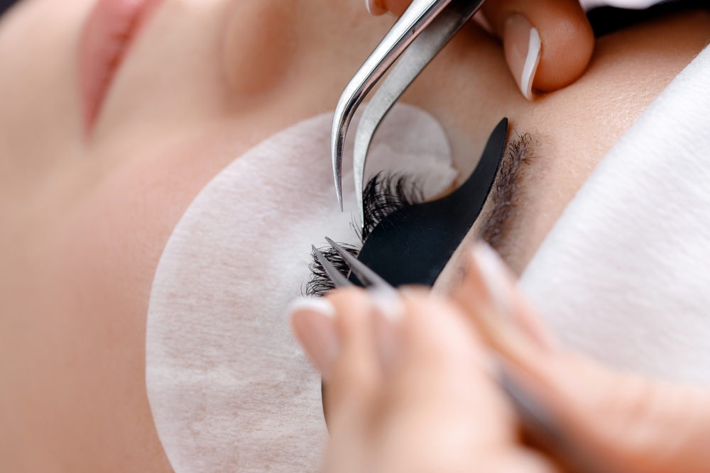 professional,eyelash,extension,procedure,on,young,caucasian,female.
